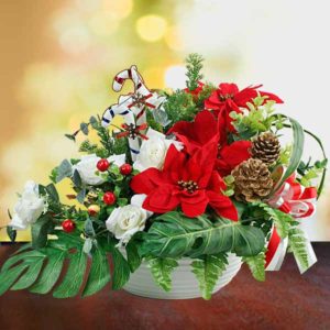 pointsettia winter weddin flower arrangement