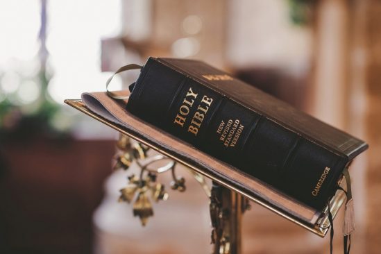 A bible resting on a lectern