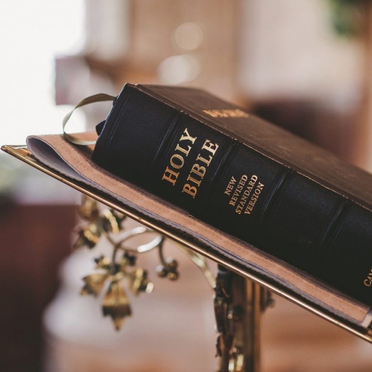 A bible resting on a lectern