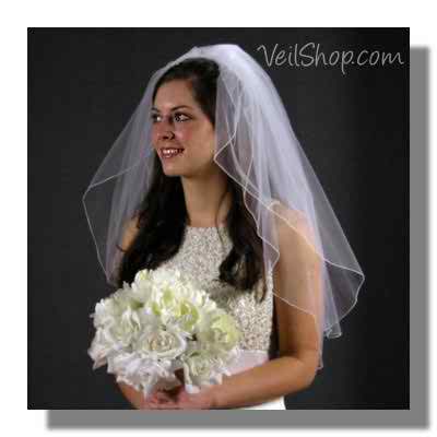 Brunette bride exposing a white wedding look