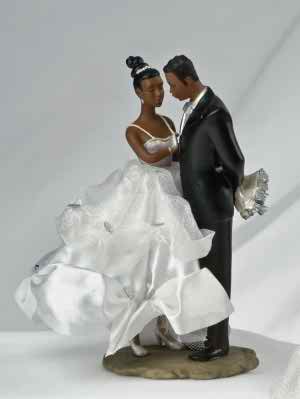 Figurines as wedding cake toppers