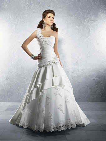 one shoulder bridal gown and different styles of lace
