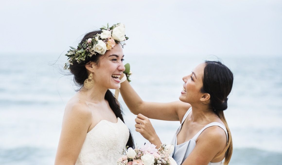 Cheerful bride at the beach