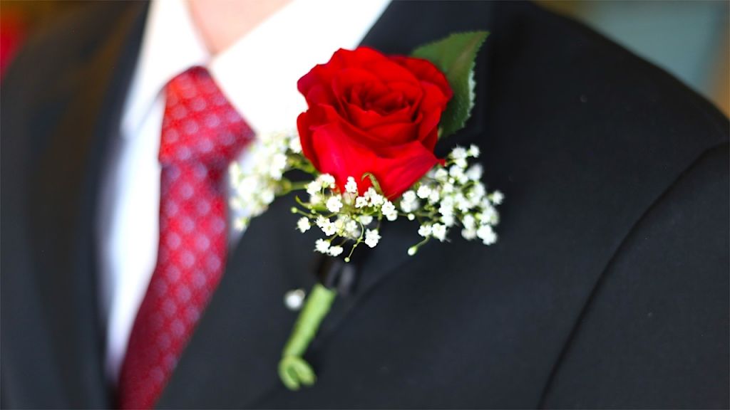 Red Boutonniere on Lapel