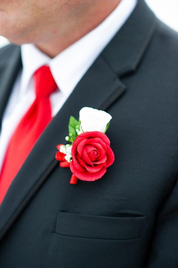 red and white boutonniere