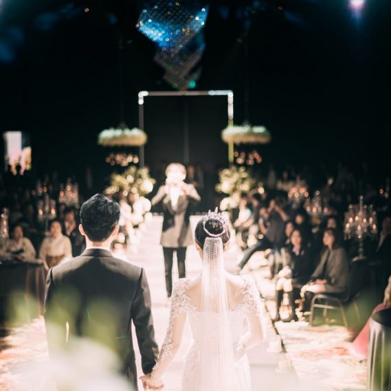 wedding couple walking down the isle
