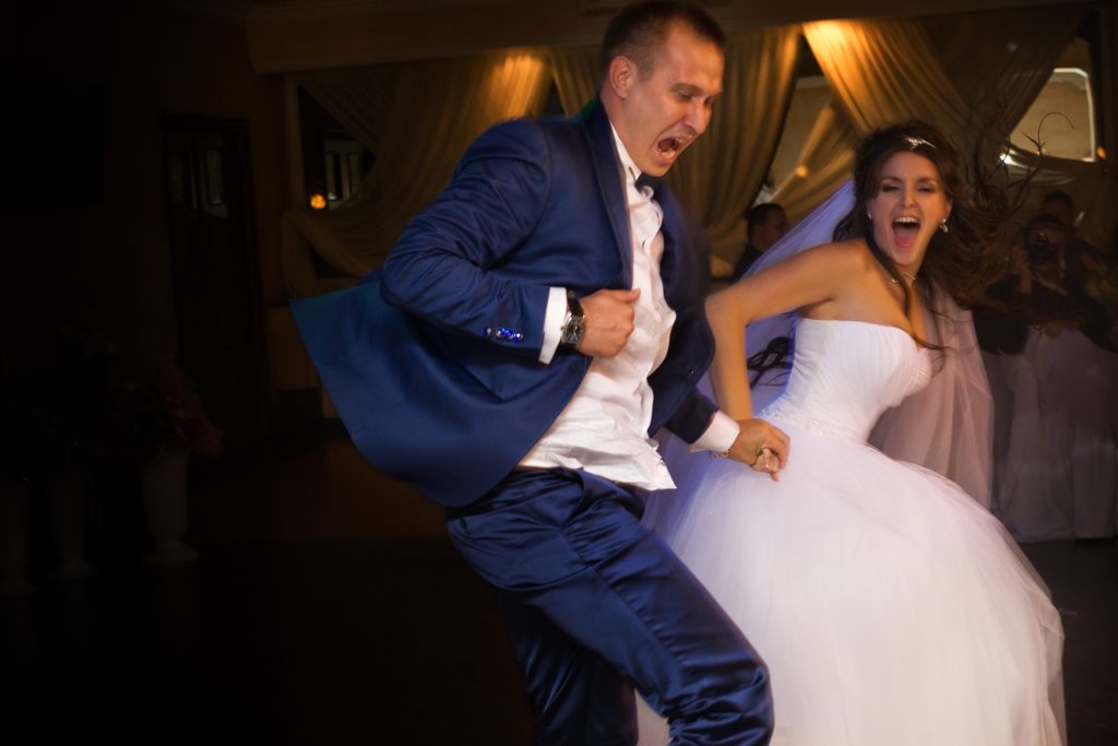 Bride and Groom dancing their hearts out during first dance