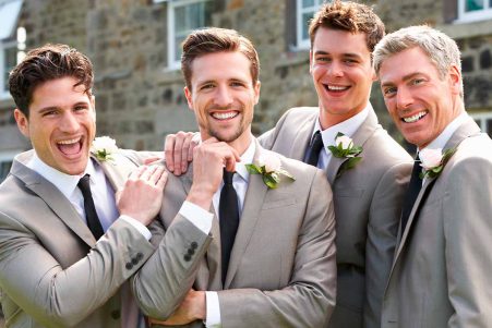 groom and groomsmen with various hairstyles