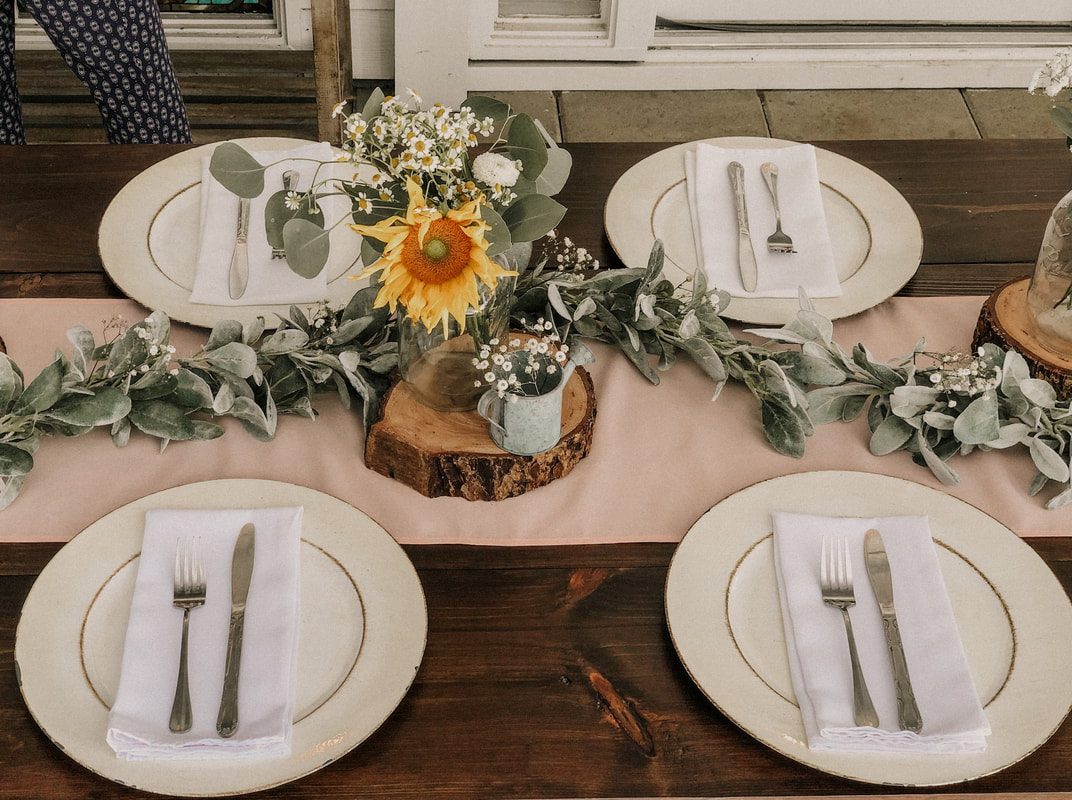 rustic plate setting with wooden centerpiece