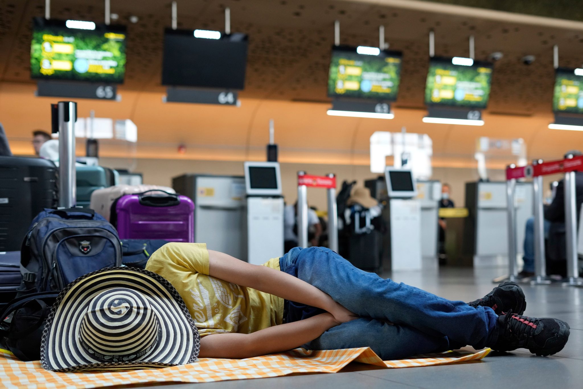 person sleeping in an airport